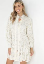 Jasnobeżowa Sukienka Toppey. Brązowe sukienki damskie Born2be, m, w ażurowe wzory, z koronki, boho, bez kołnierzyka, bez ramiączek, mini. Za 219.99 zł.