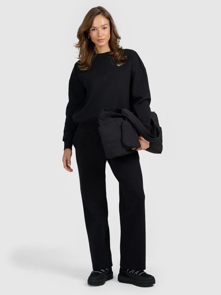 4F Spodnie dresowe z szerokimi nogawkami damskie - czarne XL. Czarne spodnie dresowe damskie 4F, bez wzorów, z dresówki. Za 169.99 zł.