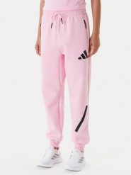 Adidas Spodnie dresowe Z.N.E. JC5405 Różowy Regular Fit. Czerwone spodnie dresowe damskie Adidas, bez wzorów, z bawełny. Za 299.99 zł.