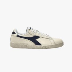 Sneakers Diadora Game Low Waxed Niebieskie. Białe buty sportowe męskie Diadora, bez wzorów, bez zapięcia. Za 422.96 zł.