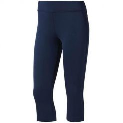 Spodnie sportowe damskie Reebok Wor PP Capri. Niebieskie spodnie dresowe damskie Reebok, bez wzorów, sportowe, długie. Za 123.00 zł.