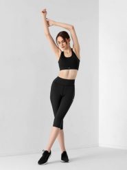 4F Legginsy treningowe 3/4 ze średnim stanem damskie XXS. Czarne legginsy damskie 4F, bez wzorów, z dzianiny. W wyprzedaży za 49.99 zł.