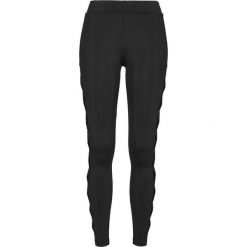 Damskie klasyczne legginsy miejskie w prążki. Czarne legginsy damskie Urban Classics, bez wzorów. Za 160.50 zł.