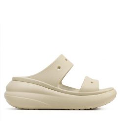 Klapki Crocs. Brązowe klapki damskie Crocs, bez wzorów, bez obcasa, bez zapięcia. Za 239.99 zł.