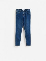 Jeansy slim fit - granatowy. Niebieskie jeansy damskie Reserved, bez wzorów, z bawełny. Za 99.99 zł.