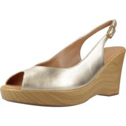 Sandały UNISA RACHEL LMT Złoty. Żółte sandały damskie Unisa, bez wzorów, ze skóry, bez obcasa, bez zapięcia. Za 390.99 zł.