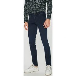 Armani Exchange - Jeansy. Niebieskie jeansy męskie Armani Exchange, z bawełny. W wyprzedaży za 449.90 zł.