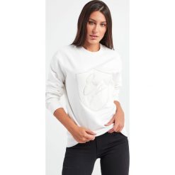 Bluza damska EMPORIO ARMANI. Bluzy damskie Emporio Armani, m, bez wzorów, bez ramiączek, bez kaptura. W wyprzedaży za 428.77 zł.