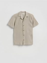 Strukturalna koszula regular fit - beżowy. Brązowe koszule męskie Reserved, l, bez wzorów, z dzianiny, bez kołnierzyka, bez ramiączek. Za 129.99 zł.
