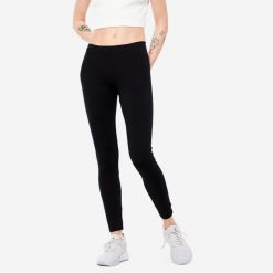 Legginsy fitness damskie Nyamba 100 Salto. Czarne legginsy damskie DOMYOS, bez wzorów, z bawełny. Za 29.99 zł.