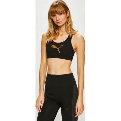 Puma - Biustonosz sportowy. Czarne bielizna sportowa damska Puma, l, bez wzorów, z elastanu, climacool (adidas). Za 139.90 zł.