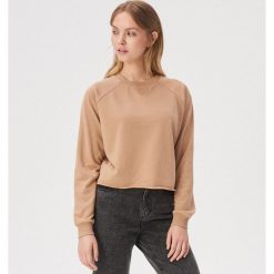 Gładka bluza z raglanowymi rękawami - Beżowy. Brązowe bluzy damskie Sinsay, l, bez wzorów, bez ramiączek, bez kaptura. Za 29.99 zł.
