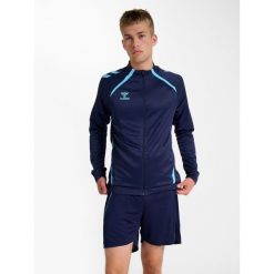 Kurtka wodoodporna Hummel Lead 2.0. Niebieskie kurtki sportowe damskie Hummel, bez wzorów, bez ramiączek, bez kaptura. Za 279.50 zł.