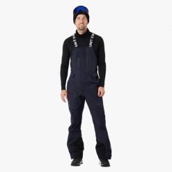 Spodnie narciarskie męskie Swedemount Lofoten 3L Shell Bib Pants II wodoodporne. Niebieskie spodnie sportowe męskie SWEDEMOUNT, l, bez wzorów, narciarskie. W wyprzedaży za 672.00 zł.