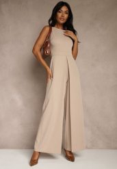 Beżowy Taliowany Kombinezon Ozdobiony Zakładkami Berinola. Brązowe sukienki damskie Renee, na imprezę, l, bez wzorów, eleganckie, bez kołnierzyka, bez ramiączek. Za 129.99 zł.