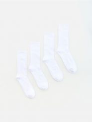 4 pack długich skarpet - biały. Białe skarpety męskie Reserved, bez wzorów. Za 49.99 zł.