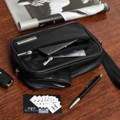 Saszetka męska skórzana do ręki dwukomorowa Beltimore R05. Saszetki i nerki męskie bez wzorów. Za 124.99 zł.