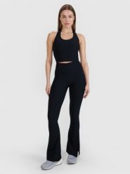 4F Legginsy z rozszerzanymi nogawkami damskie 4F x Anna Lewandowska - czarne M. Czarne legginsy damskie 4F, bez wzorów, z dzianiny. Za 99.99 zł.