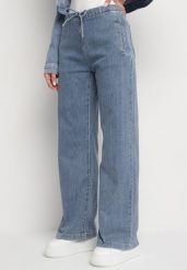 Niebieskie Jeansy z Szeroką Nogawką Gumką w Pasie i Wysokim Stanem Velvila. Niebieskie jeansy damskie Born2be, bez wzorów, z jeansu, eleganckie, z podwyższonym stanem, długie. Za 119.99 zł.