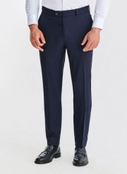 PAKO LORENTE - Wełniane granatowe spodnie garniturowe. Garnitury męskie Pako Lorente, m, bez wzorów, z wełny, biznesowe. Za 799.99 zł.