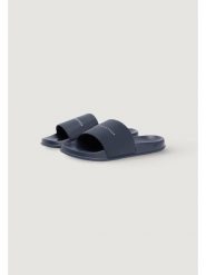 Tommy Hilfiger Klapki FM0FM05799 Niebieski. Niebieskie klapki męskie Tommy Hilfiger, bez wzorów, bez zapięcia. Za 169.99 zł.