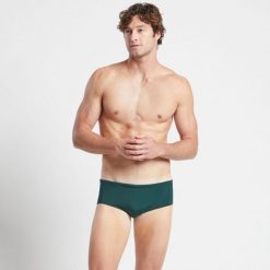 Slipy kąpielowe męskie FINIS Aqua Short Solid. Zielone kąpielówki męskie FINIS, m, bez wzorów. Za 129.99 zł.