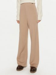 Calvin Klein Spodnie dresowe K20K207680 Beżowy Relaxed Fit. Brązowe spodnie dresowe damskie Calvin Klein, bez wzorów, z dresówki. Za 559.99 zł.