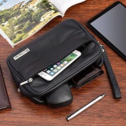 Czarna skórzana saszetka męska do ręki Beltimore R09. Czarne saszetki i nerki męskie do ręki. Za 99.90 zł.