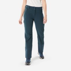 Spodnie turystyczne damskie Quechua SH500 Warm. Niebieskie spodnie sportowe damskie QUECHUA, na zimę, bez wzorów, z materiału, sportowe, trekkingowe. Za 249.99 zł.