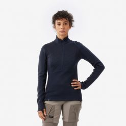 Koszulka damska trekkingowa z długim rękawem Merino Resist. Czarne bluzki damskie FORCLAZ, l, bez wzorów, z materiału, sportowe, bez kołnierzyka, bez ramiączek. Za 299.99 zł.