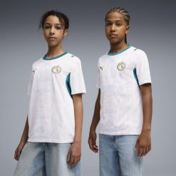 Młodzieżowa koszulka domowa Senegal 2026 PUMA. Biała bluzki damskie Puma, l, bez wzorów, młodzieżowe, bez kołnierzyka, bez ramiączek. Za 339.00 zł.