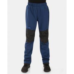 Pantaloni outdoor softshell per bambini Kilpi RIZO-J. Niebieskie spodnie sportowe damskie Kilpi, na lato, bez wzorów, z softshellu, sportowe, outdoorowe. Za 179.35 zł.