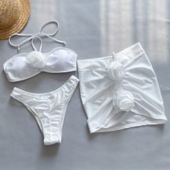 Strój kąpielowy z kwiatami 3D na plażę i basen Lydianne. Białe stroje kąpielowe damskie Intica, s, bez wzorów, z materiału. Za 219.00 zł.