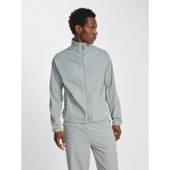 Kurtka z dresu Hummel Pulse. Szare kurtki męskie Hummel, bez wzorów, z dresówki, sportowe, bez kaptura. Za 286.50 zł.