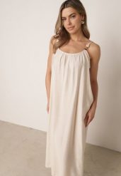 Beżowa Pudełkowa Sukienka Boho z Wiskozy na Ramiączkach z Ozdobnymi Koralikami Erane. Brązowe sukienki damskie Born2be, na co dzień, l, bez wzorów, z tkaniny, boho, bez kołnierzyka, plus size, bez ramiączek, maxi, proste. Za 89.99 zł.