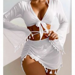 Komplet bikini z pareo i wielofunkcyjnym topem na plażę Maili. Zielone bikini Intica, bez wzorów, z materiału. Za 149.00 zł.