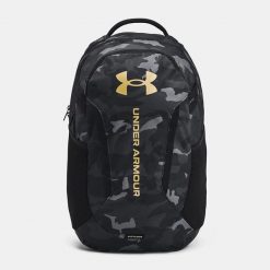 Plecak sportowy miejski szkolny Under Armour Hustle 6 29 litrów. Brązowe plecaki męskie Under Armour, bez wzorów, sportowe. Za 299.00 zł.