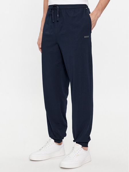 Boss Spodnie dresowe Mix&Match 50515365 Granatowy Regular Fit. Niebieskie spodnie sportowe męskie Boss, m, bez wzorów, z bawełny. Za 147.99 zł.