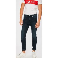 Calvin Klein Jeans - Jeansy West. Niebieskie jeansy męskie Calvin Klein Jeans, z bawełny. W wyprzedaży za 379.90 zł.