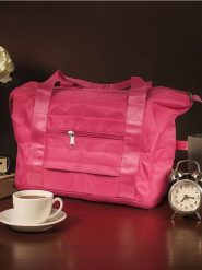 Składana torba podróżna z kieszeniami - różowy. Czerwone torby podróżne damskie Sinsay, bez wzorów. Za 32.99 zł.