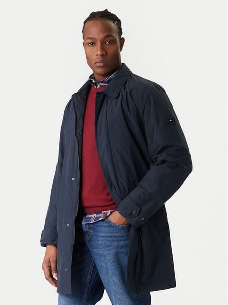 Tommy Hilfiger Płaszcz przejściowy MW0MW42569 Granatowy Regular Fit. Niebieskie płaszcze męskie Tommy Hilfiger, m, bez wzorów, z syntetyku, bez kołnierzyka, bez kaptura. Za 1,299.00 zł.