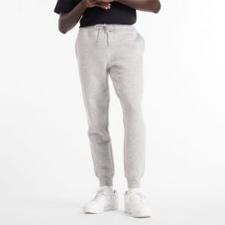 Spodnie męskie New Balance MP43904AG – szare. Szare spodnie sportowe męskie New Balance, m, bez wzorów, z bawełny. Za 149.99 zł.