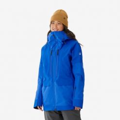 Kurtka snowboardowa damska Wedze SNB 900. Niebieskie kurtki sportowe damskie WED'ZE, na zimę, l, bez wzorów, z materiału, bez ramiączek, bez kaptura, narciarskie. Za 899.99 zł.