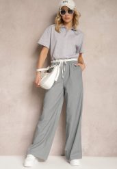 Szare Materiałowe Spodnie z Szerokimi Nogawkami High Waist z Gumką w Talii Comina. Szare spodnie materiałowe damskie Renee, bez wzorów, z jeansu, eleganckie, z podwyższonym stanem. Za 119.99 zł.