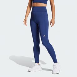 Legginsy Own the Run Full-Length. Niebieskie bielizna sportowa damska Adidas, bez wzorów, z materiału. W wyprzedaży za 227.90 zł.