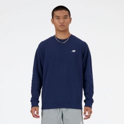 Bluza męska New Balance MT41507NNY – granatowa. Niebieskie bluzy męskie New Balance, m, z aplikacjami, z bawełny, klasyczne, bez ramiączek, bez kaptura. Za 279.99 zł.