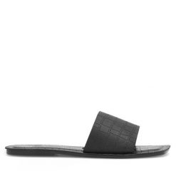 Klapki JENNY. Czarne klapki damskie Jenny, bez wzorów, bez obcasa, bez zapięcia. Za 39.99 zł.