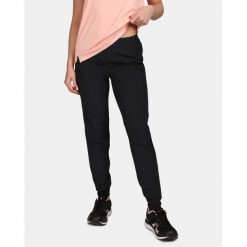 Damskie spodnie do biegania Kilpi HEYES-W. Czarne spodnie dresowe damskie Kilpi, bez wzorów, z dresówki, sportowe. Za 254.99 zł.