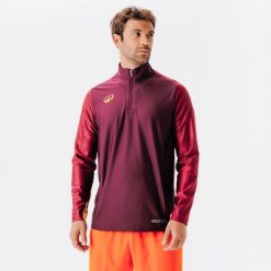 Bluza piłkarska Kipsta Viralto Wavy Club na krótki suwak. Czerwone bluzy męskie KIPSTA, m, bez wzorów, z elastanu, sportowe, bez ramiączek, bez kaptura. Za 129.99 zł.