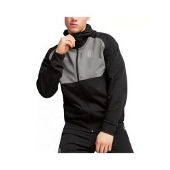 Kurtka z dresu Milan AC 2024/25. Czarne kurtki sportowe męskie Puma, bez wzorów, z dresówki, bez kaptura, do piłki nożnej. W wyprzedaży za 294.95 zł.